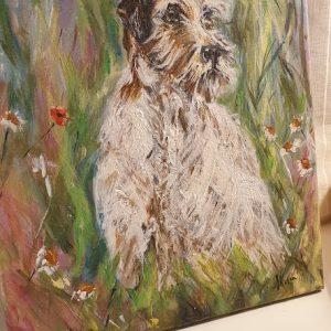 Signed original painting of a scruffy terrier dog standing in a wild green meadow with tiny flowers.